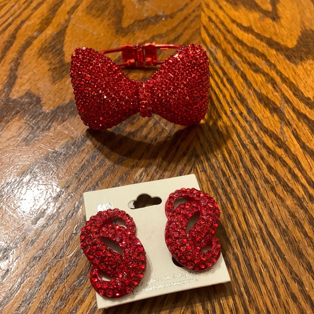 Red clip on rhinestone earrings and red bracelet